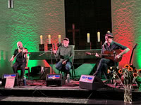 John McCusker, Mike McGoldrick and John Doyle at Lottes Musiknacht at Thomaskirche in Elmshorn, Germany, on 22 November 2025; photo Reinhard Zierke